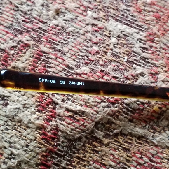 PRADA Sunglasses Model:PRADA SPR 10B Frame Color:Brushed Matte Silver Tortoise - Picture 3 of 13